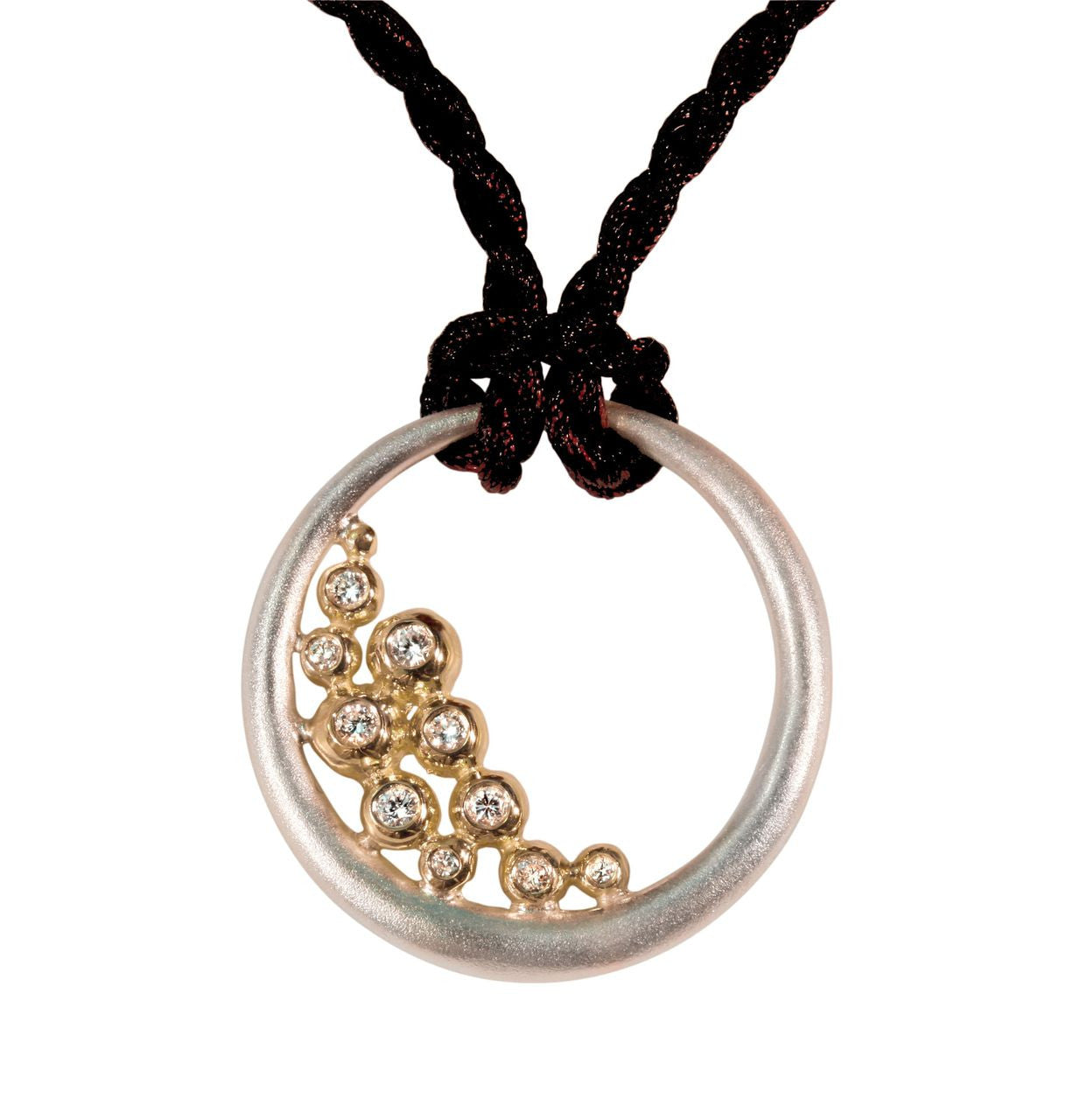 Abundance Circle Pendant: Sterling circle with 18K gold of diamonds.