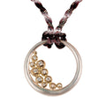 Abundance Circle Pendant: Sterling circle with 18K gold of diamonds.