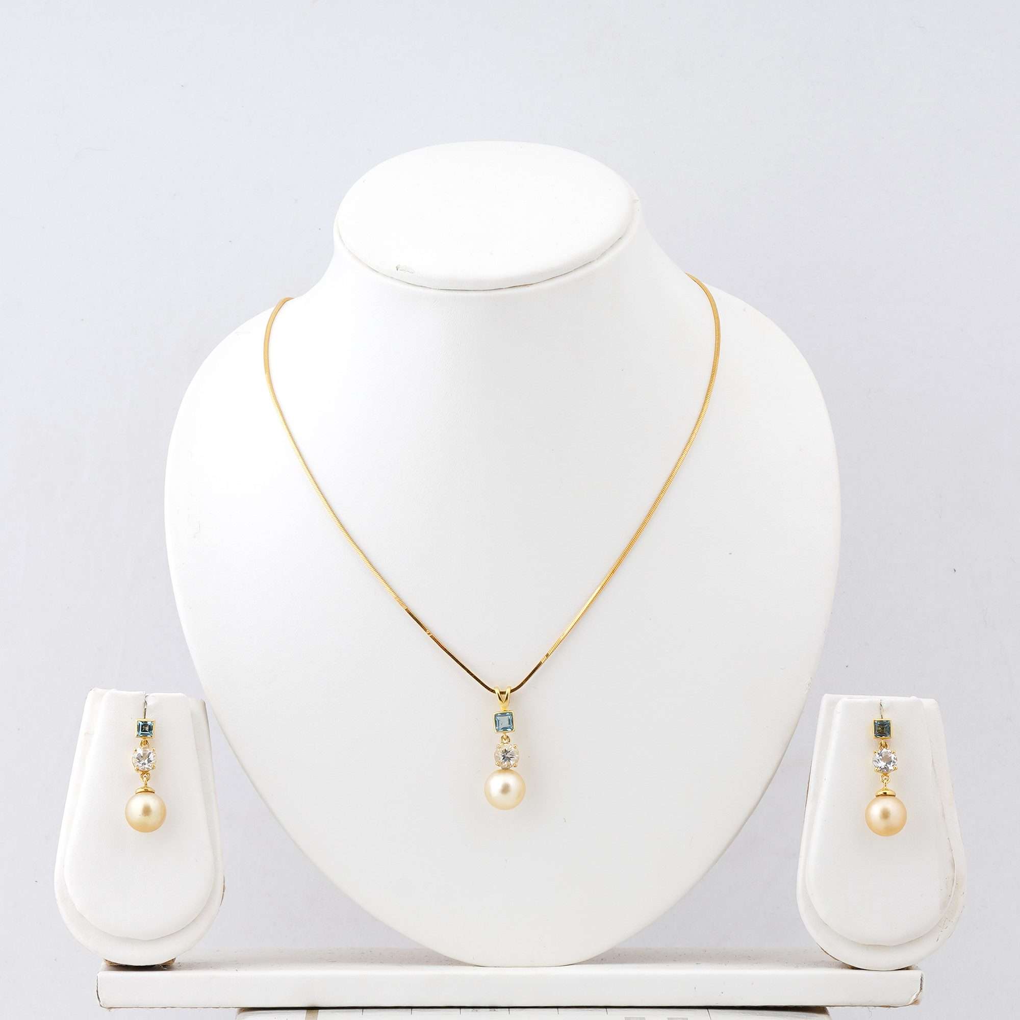 Golden South Sea pearl drop earrings with blue and white topaz