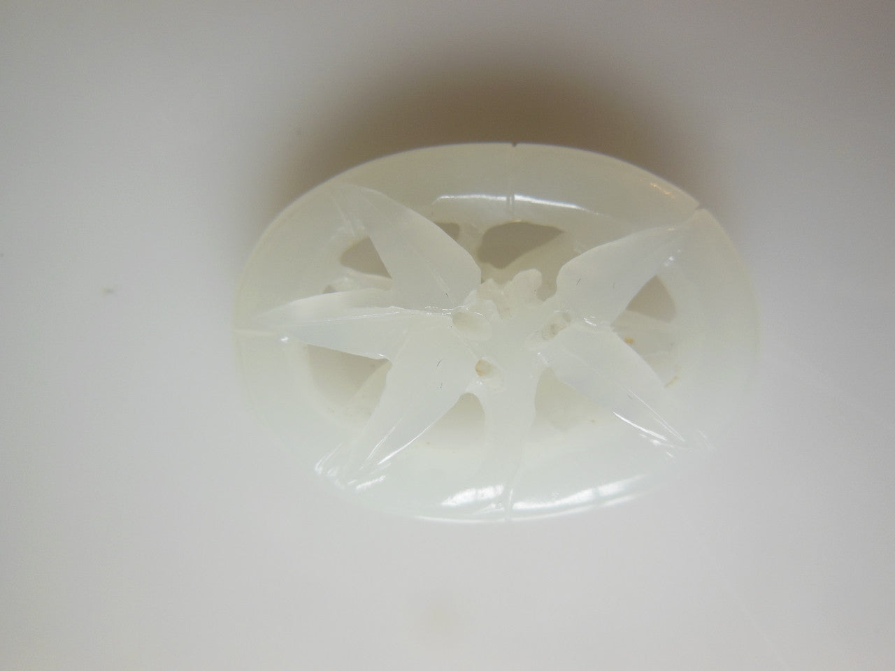 Jade Pendant- Carved white jade from China.