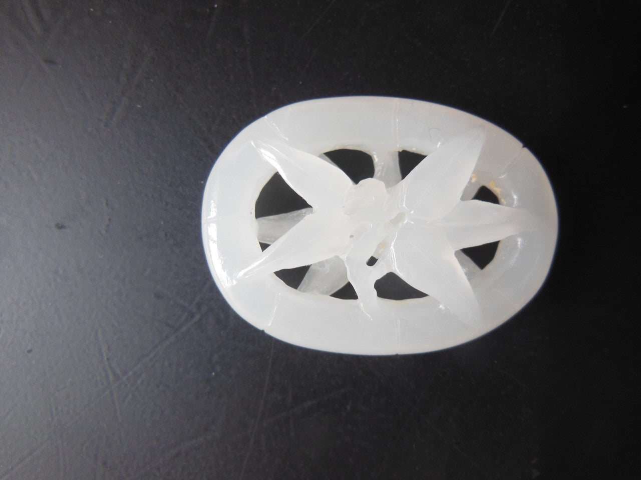 Jade Pendant- Carved white jade from China.