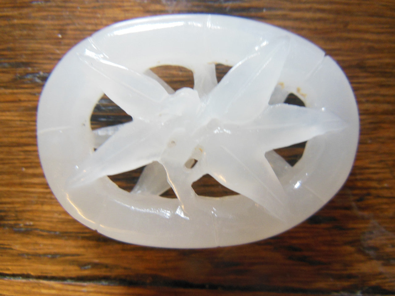 Jade Pendant- Carved white jade from China.