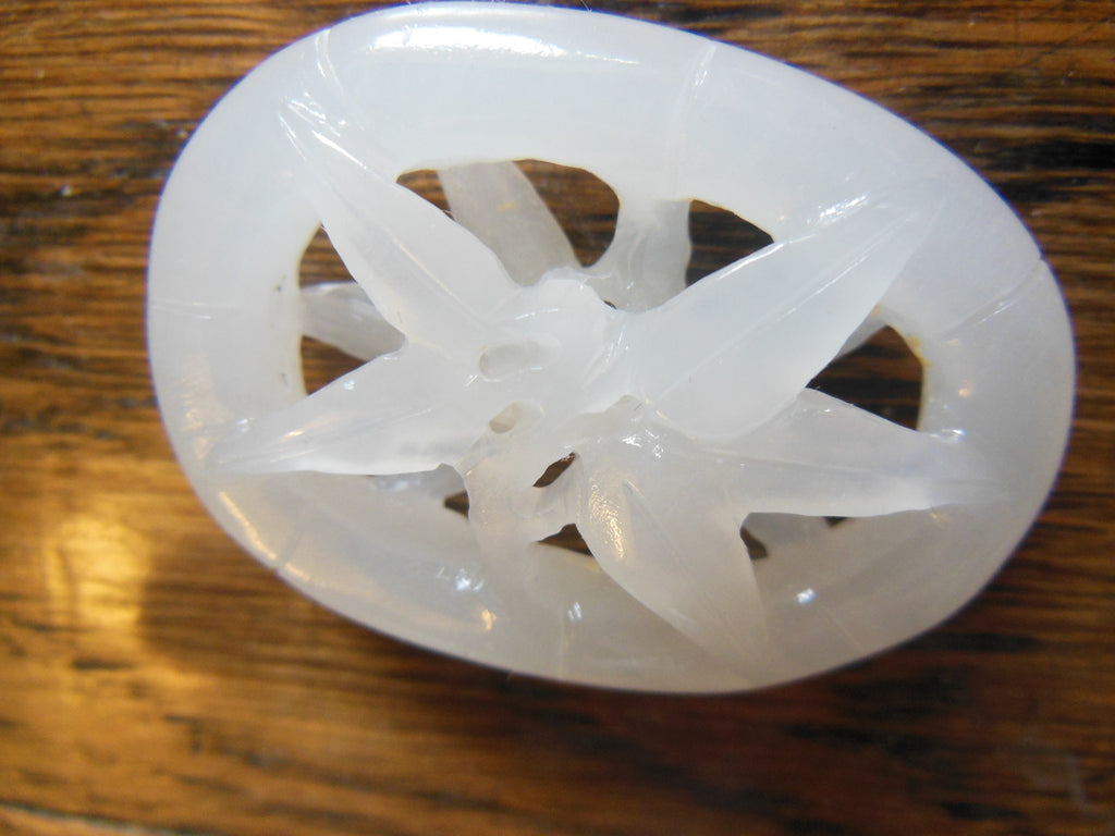 Jade Pendant- Carved white jade from China.