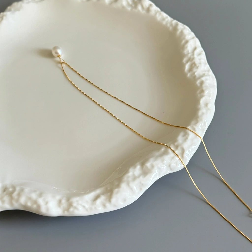 Timeless elegance in 18K gold and sterling silver. A natural freshwater pearl pendant necklace — minimalist, refined, and perfect for everyday luxury.