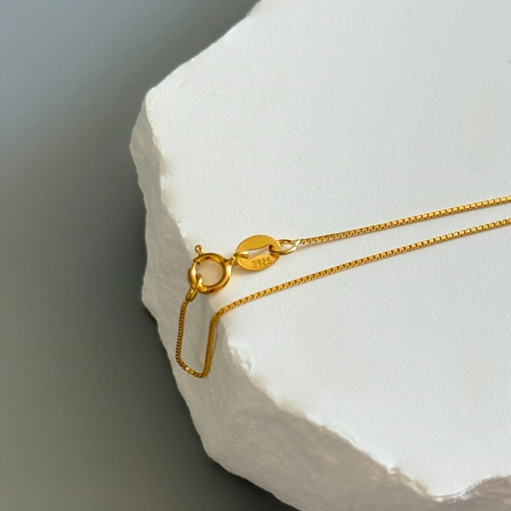 Timeless elegance in 18K gold and sterling silver. A natural freshwater pearl pendant necklace — minimalist, refined, and perfect for everyday luxury.