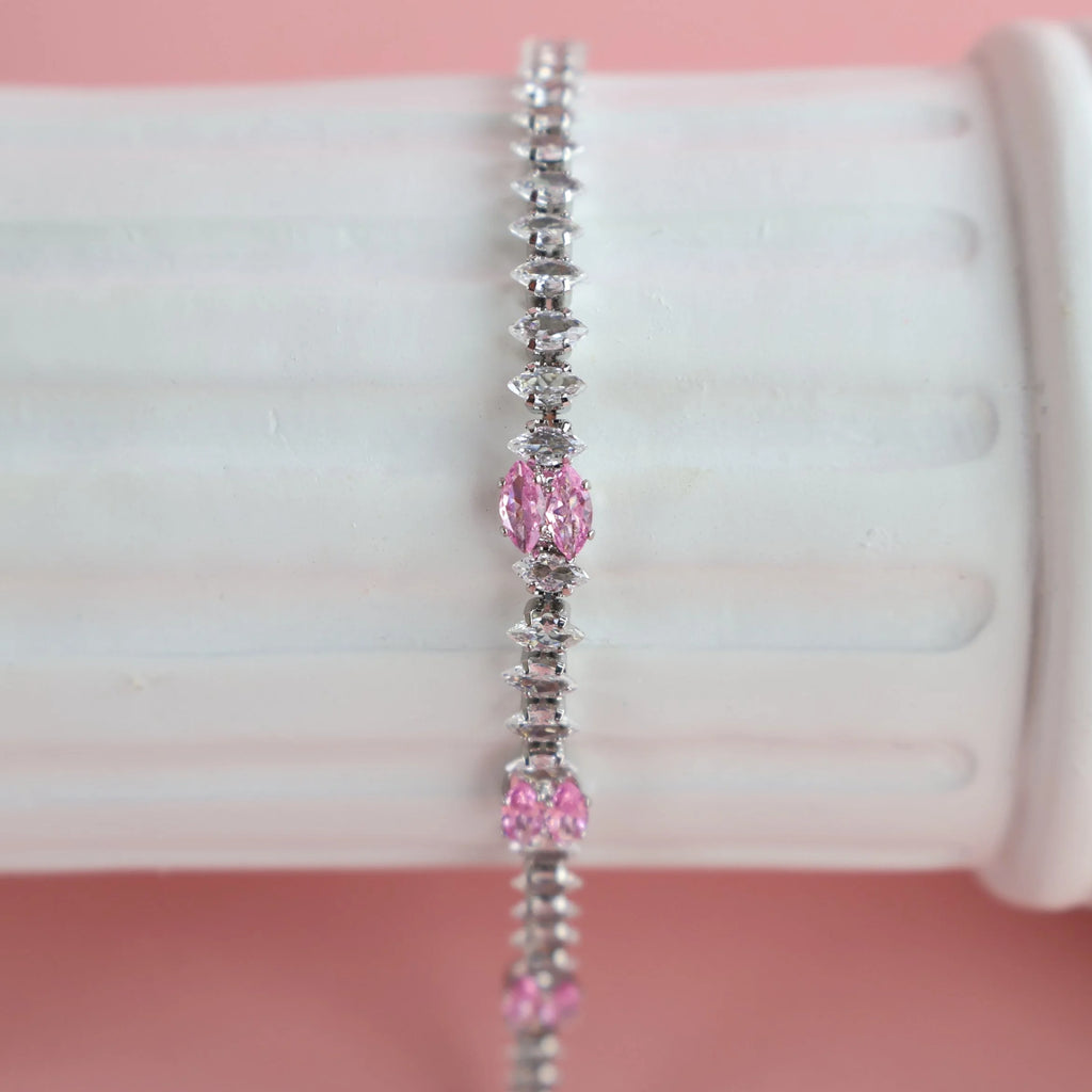 Close-up of zirconia stones sparkling on silver bracelet