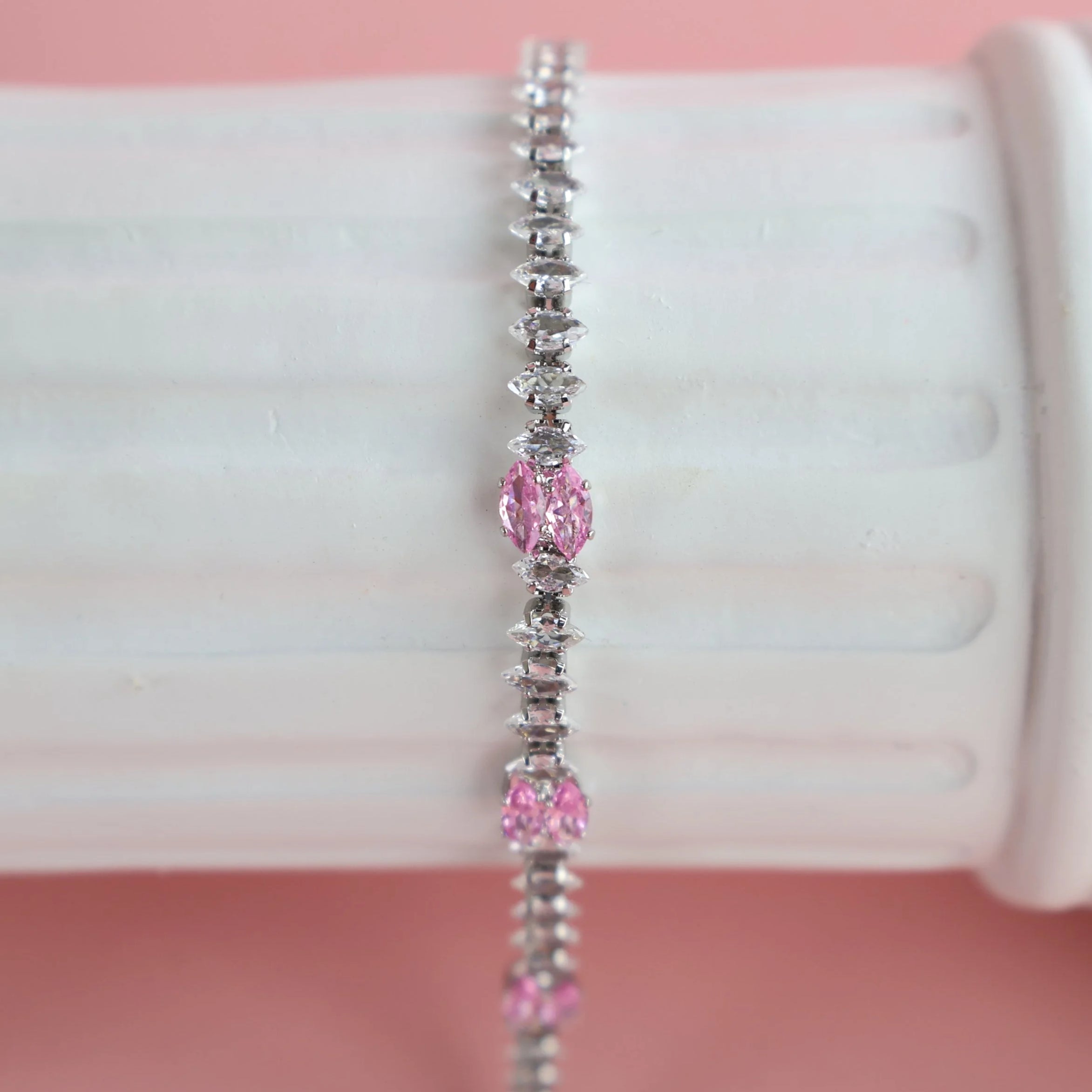 Close-up of zirconia stones sparkling on silver bracelet