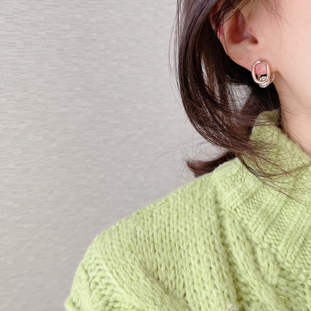 Cubic oval huggie earrings