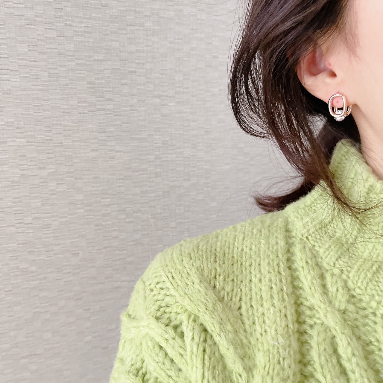 Cubic oval huggie earrings