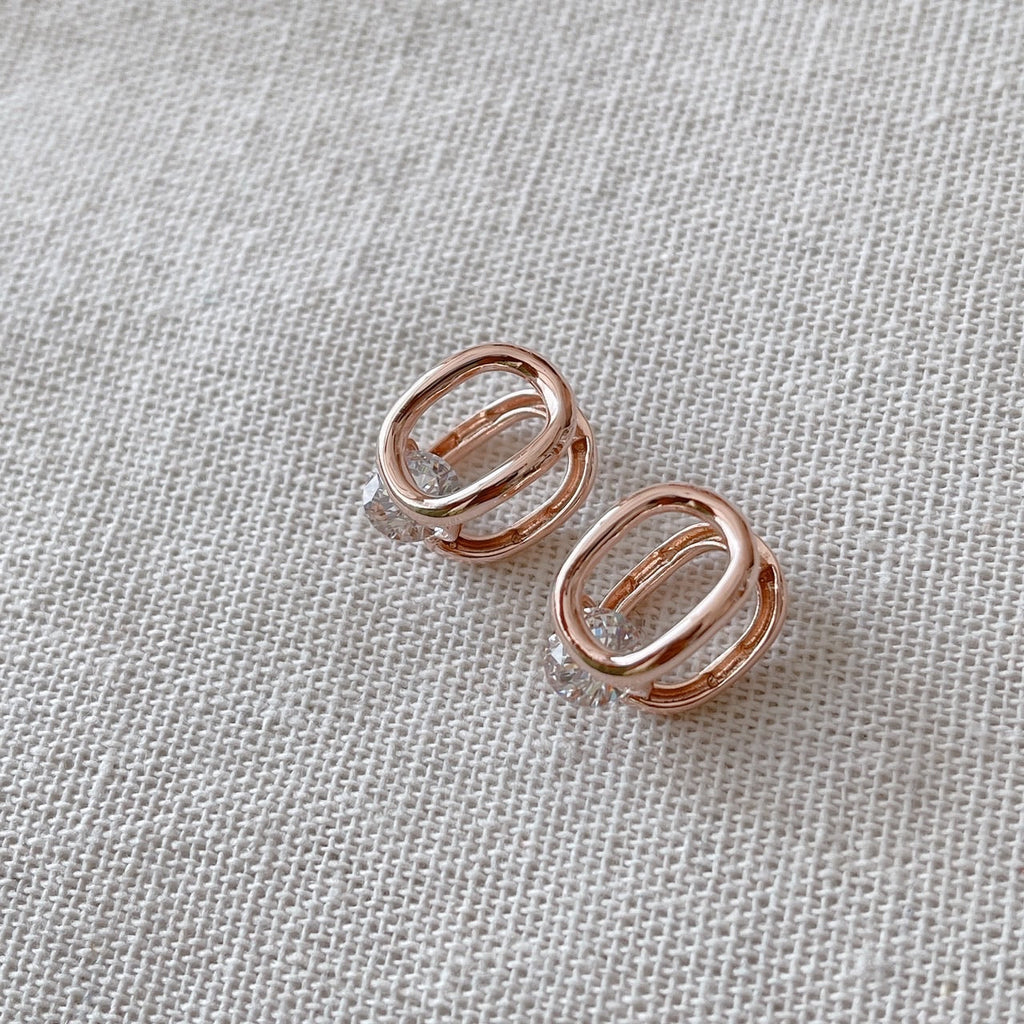 Cubic oval huggie earrings