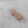Cubic oval huggie earrings